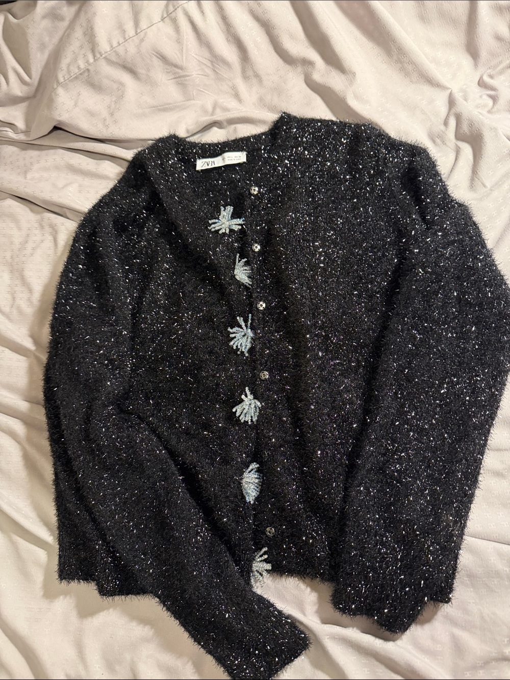 Zara Black Sparkle Cardigan with Light Blue Tassel Accents